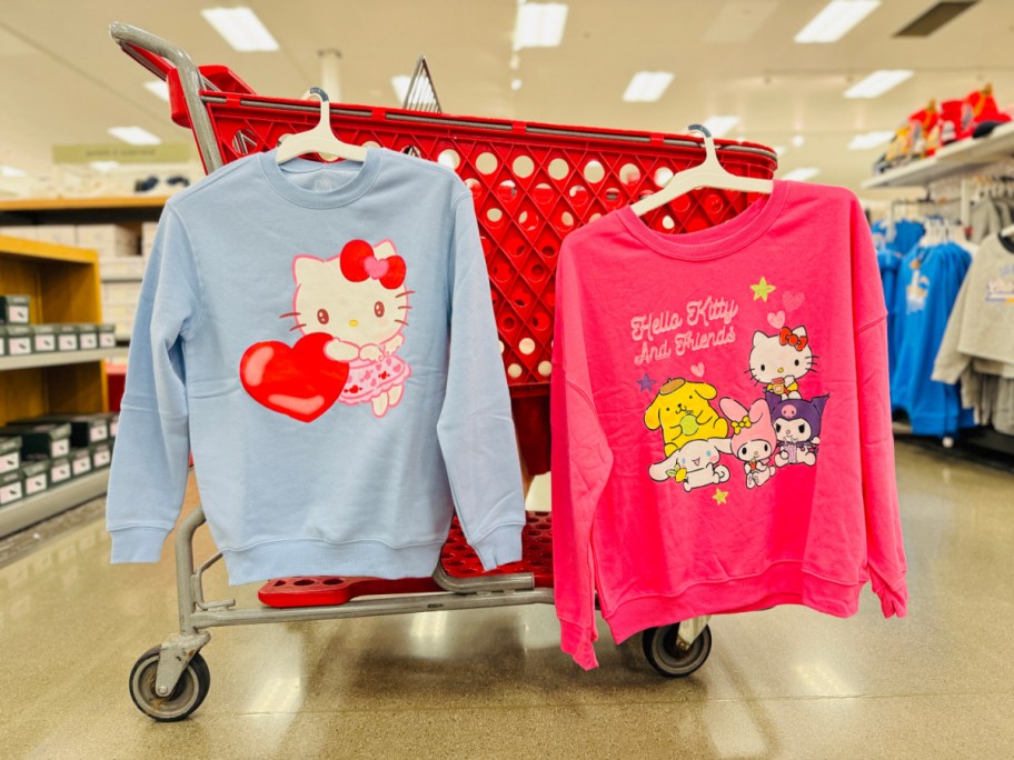 hello kitty sweatshirts hanging on target cart