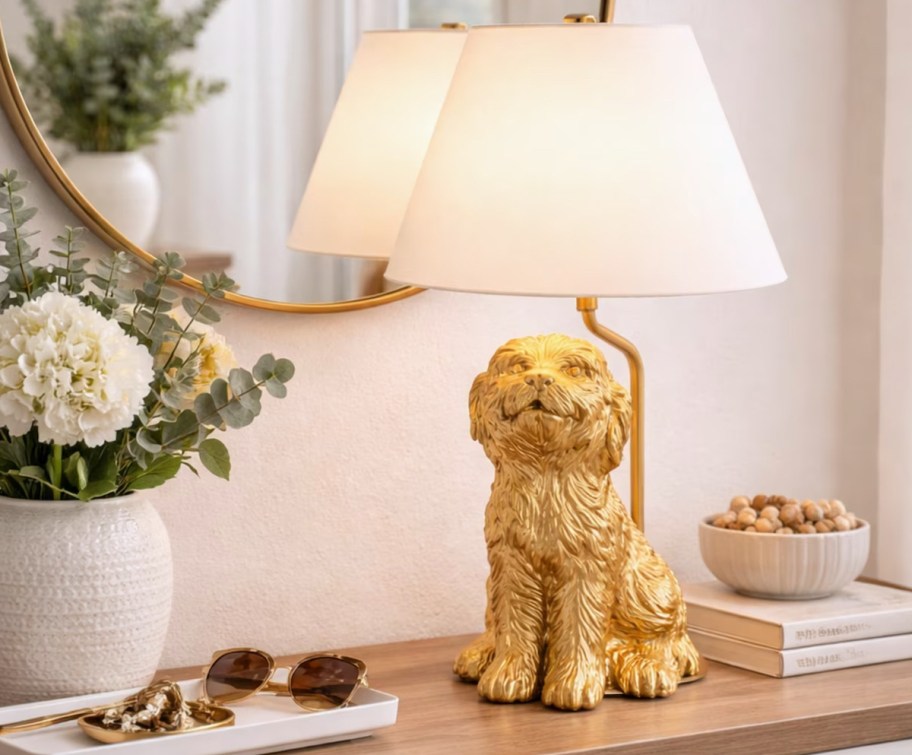 dog lamp lit up on wood dresser
