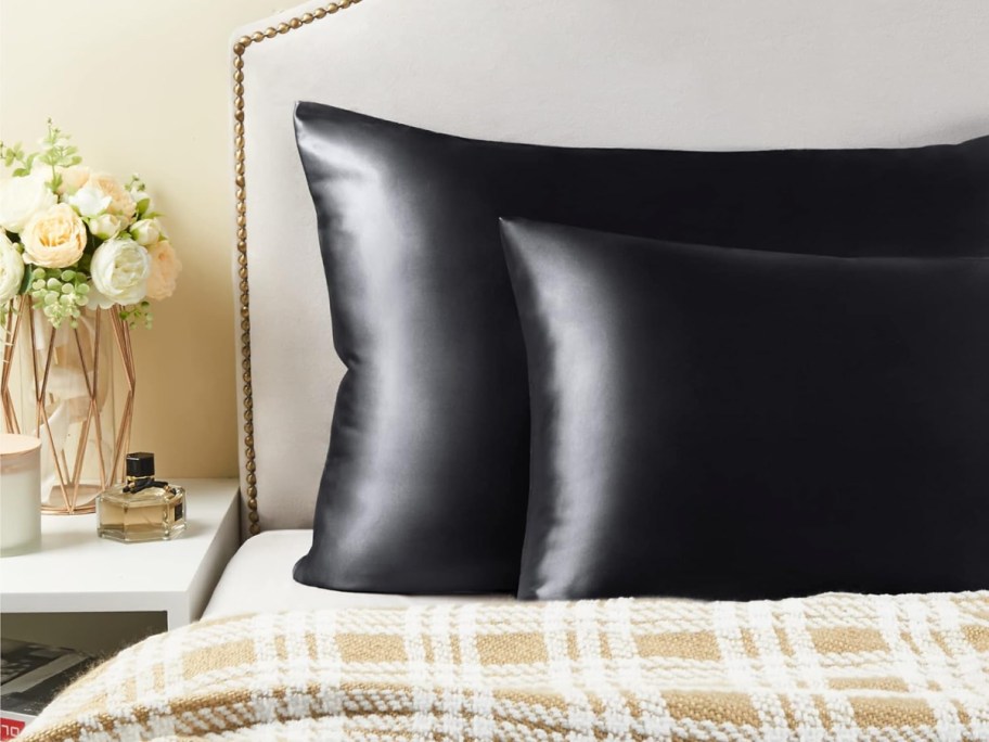 Bedelite black Satin Pillowcase displayed on the bed