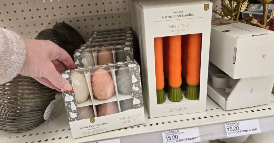 Egg and carrot candles displayed at the store