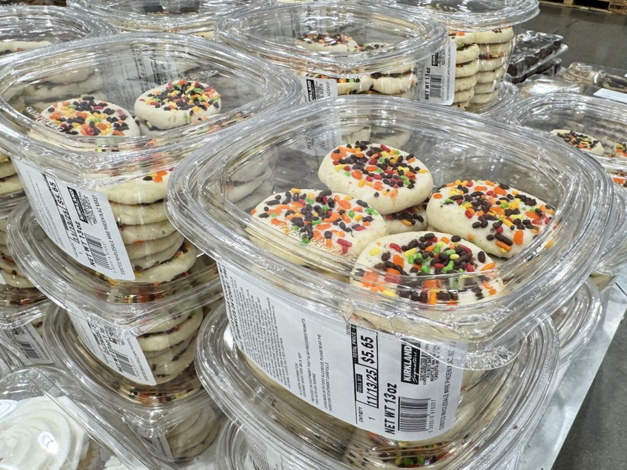 containers of sugar cookies topped with fall sprinkles