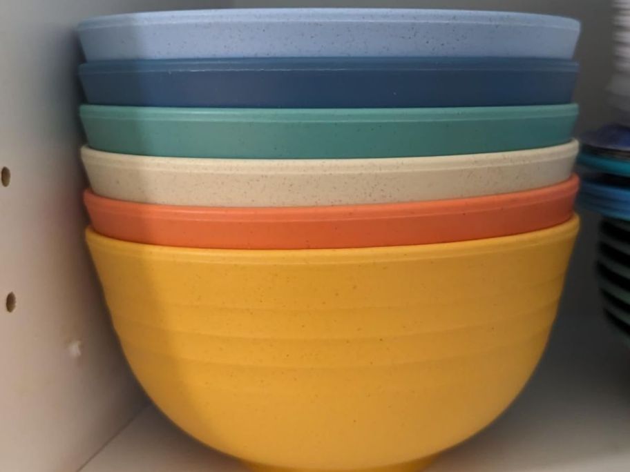 Multi-colored Homienly Bowls in a cabinet