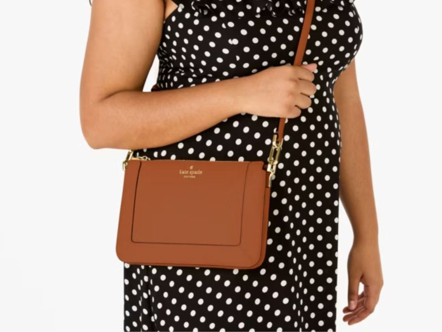 woman wearing Kate Spade Lena Double Compartment Crossbody