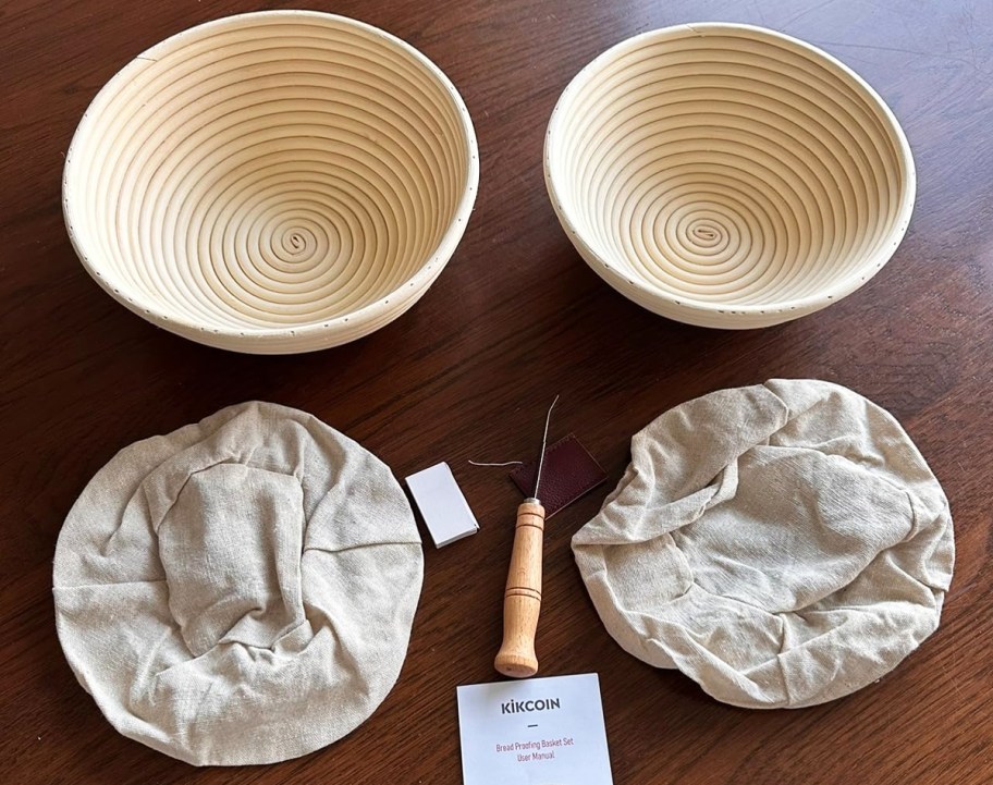 sourdough proofing baskets, liner, and knife on table