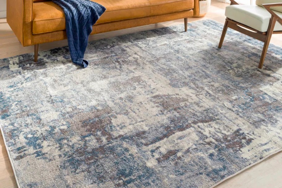 close up of blue and gray abstract rug