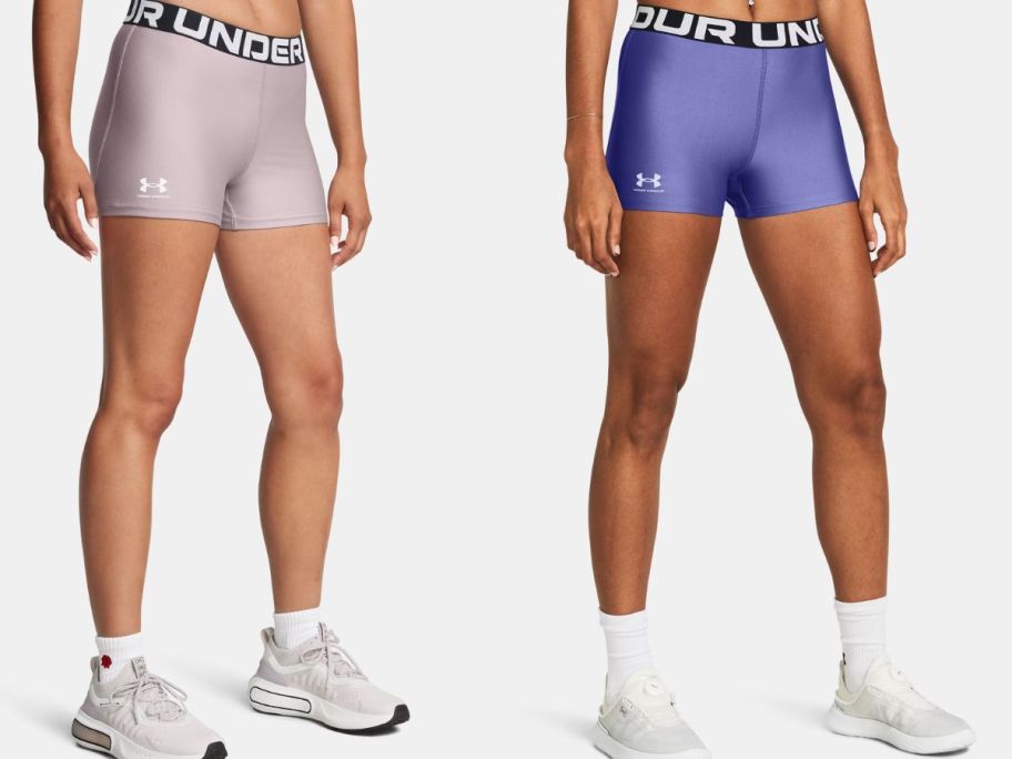 Under Armor Women's SHEATGEAR SHORTY shorts of two women's stock image
