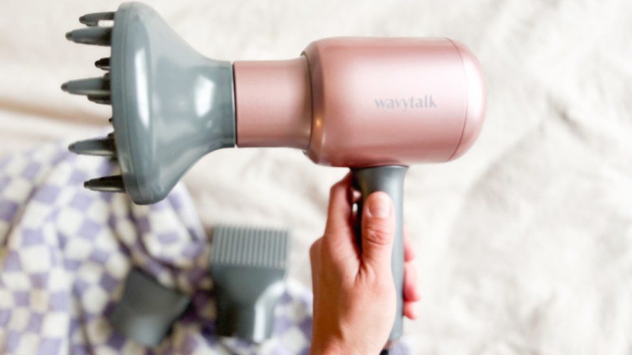 hand holding WavyTalk Hair Dryer