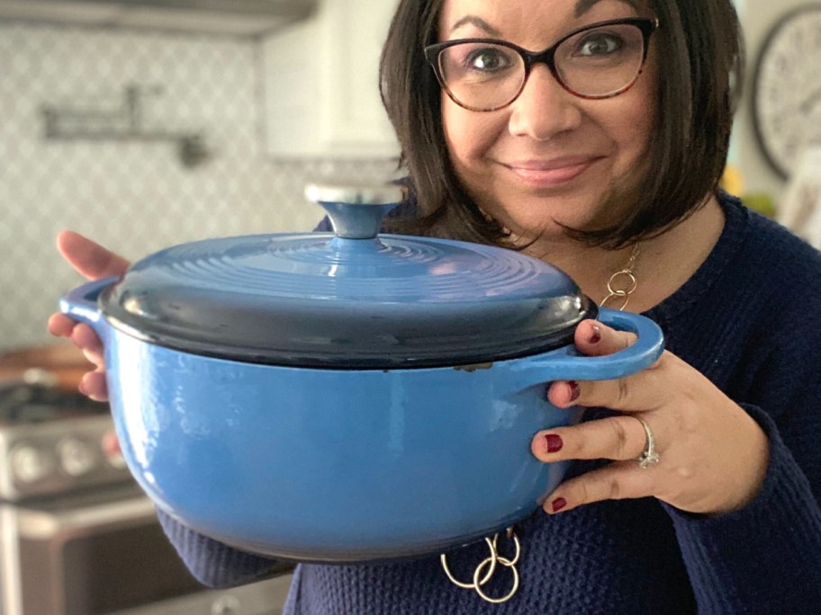 lina holding blue dutch oven