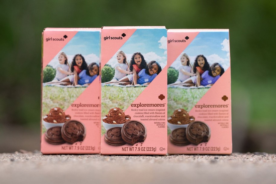 three boxes of pink cookie boxes