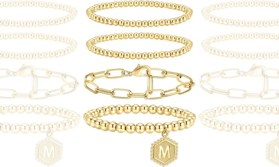 a four piece gold inital bracelet set stock image