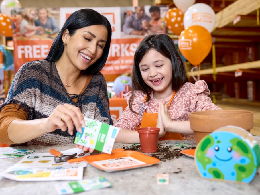 woman and girl participating in a home depot kids workshop