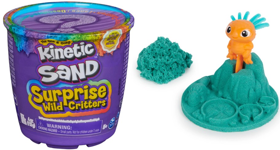 kinetic sand critter container and toy sitting next to it 