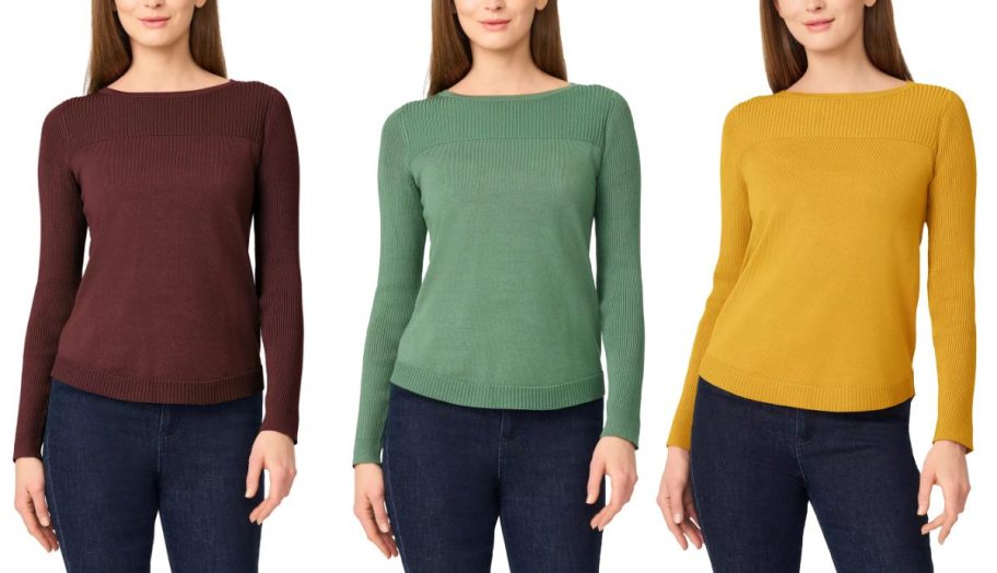 Three women wearing coloring sweaters.