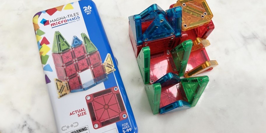 magnatiles travel tin and tiles on table