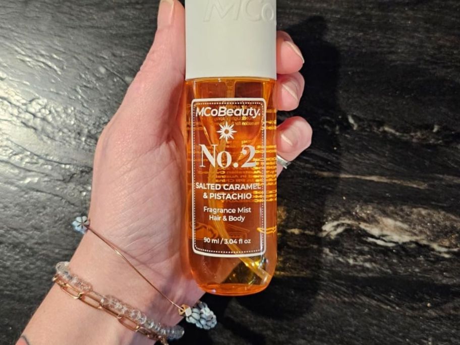 MCoBeauty Fragrance Mist in hand