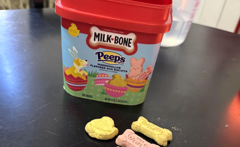 large container of milk-bone peeps treats on table 