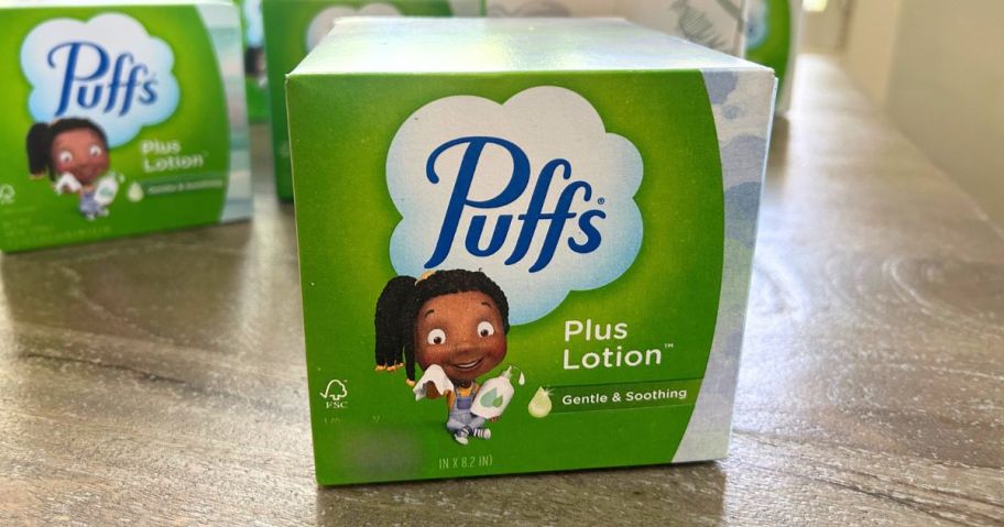 Puffs Plus Lotion Facial Tissue 48-Count box on table