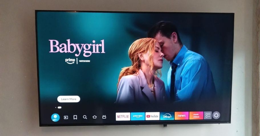 Toshiba 55" Class M550 Series QLED 4K UHD Smart Fire TV on wall