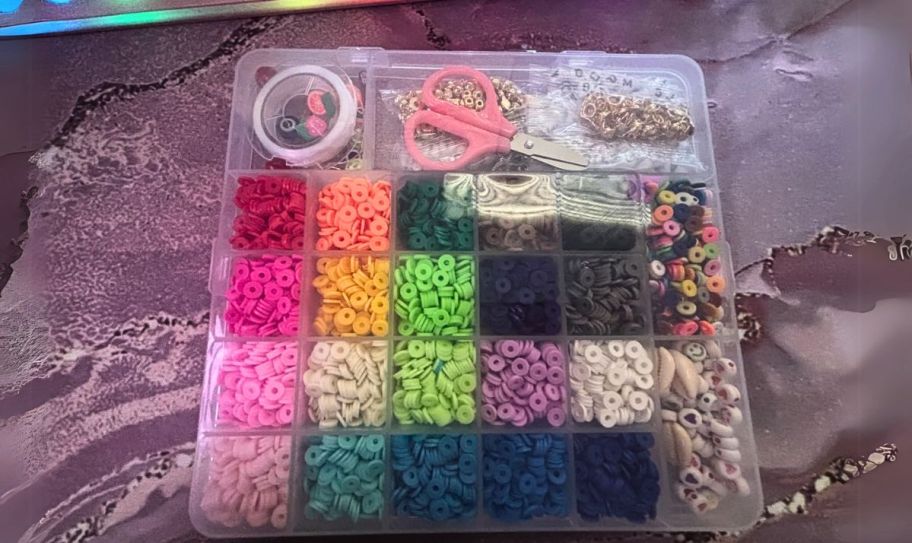 a bracelet making kit box showing beads, and included accessories