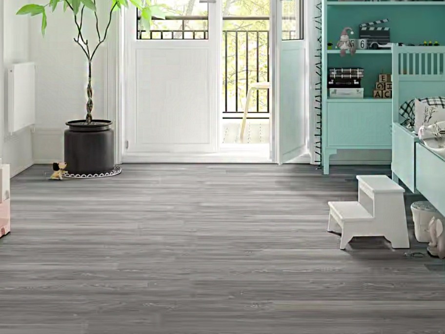 gray vinyl flooring in room 