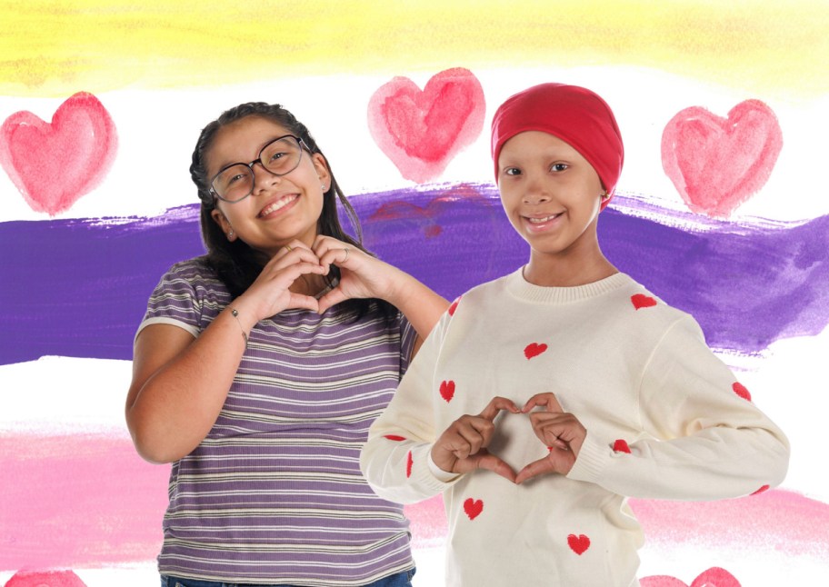 kids making heart sign with hands
