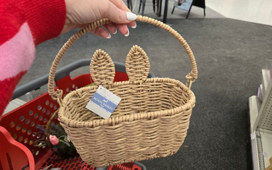 hand holding bunny baskets at the store