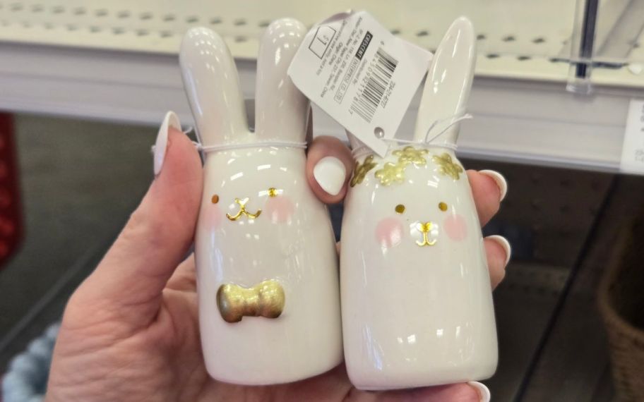 hand holding bunny salt and pepper shaker