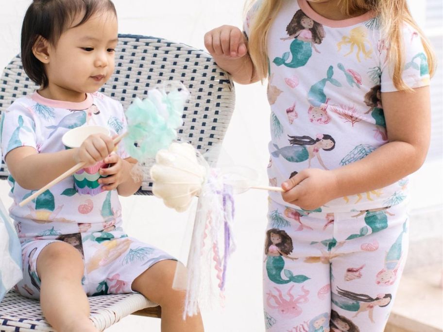 Two girls wearing Burts bees girls mermaid pajamas
