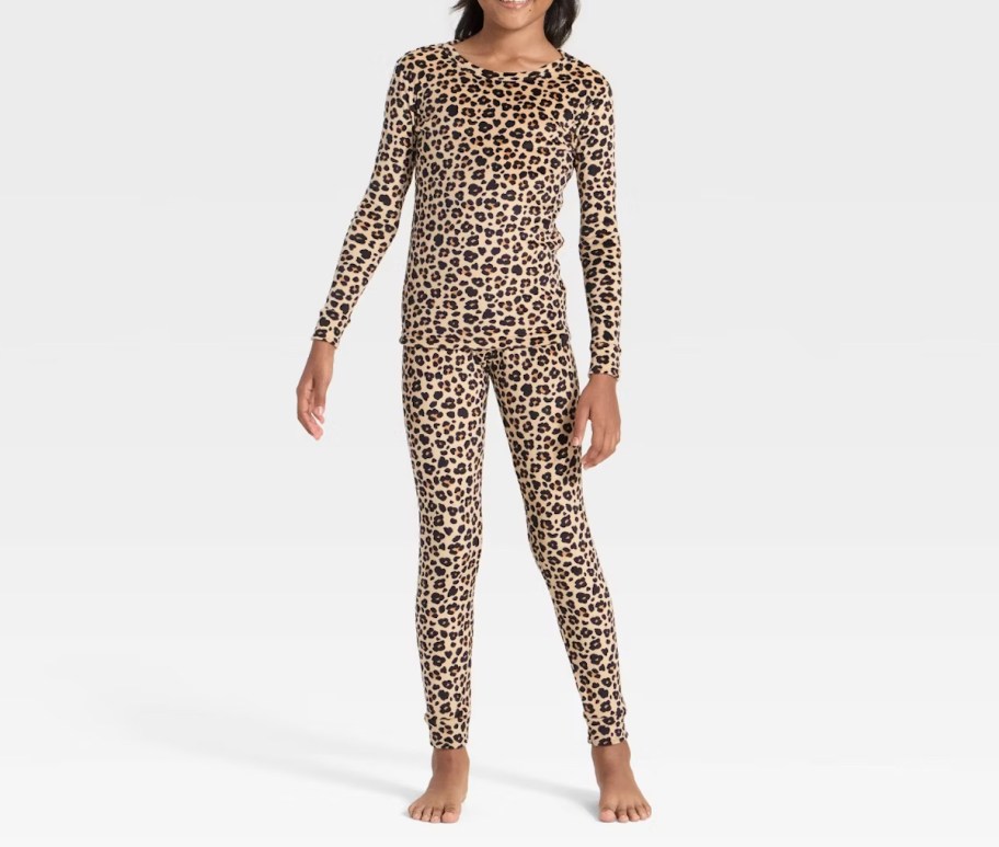 girl wearing leopard pajamas set 
