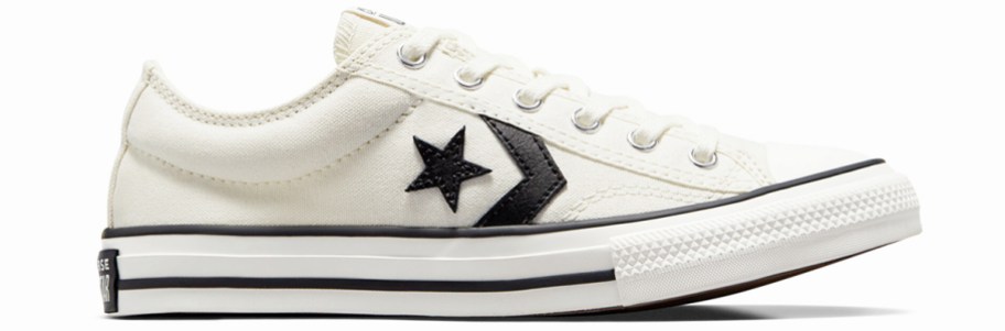 white and black low top converse sneaker