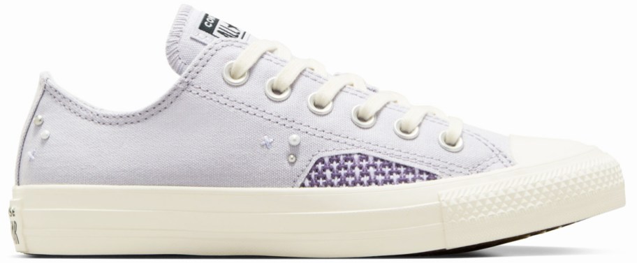 light purple low top sneaker with pearls and studs
