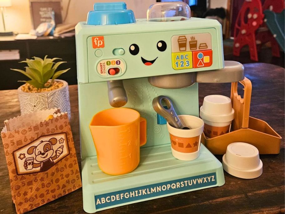 Fisher-Price Toddler Toy Laugh & Learn Coffee Café Musical Playset displayed