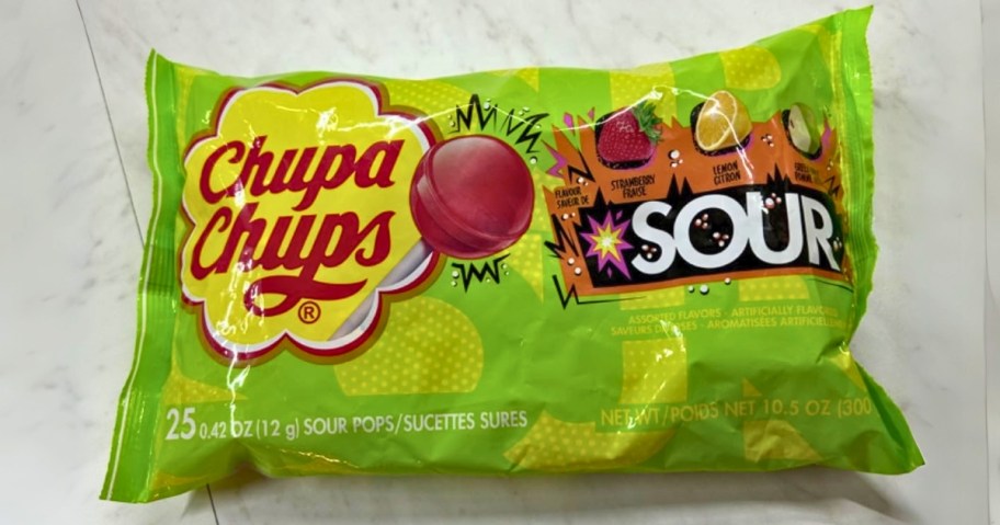 a bag of Chupa Chups Sour Lollipops on a counter