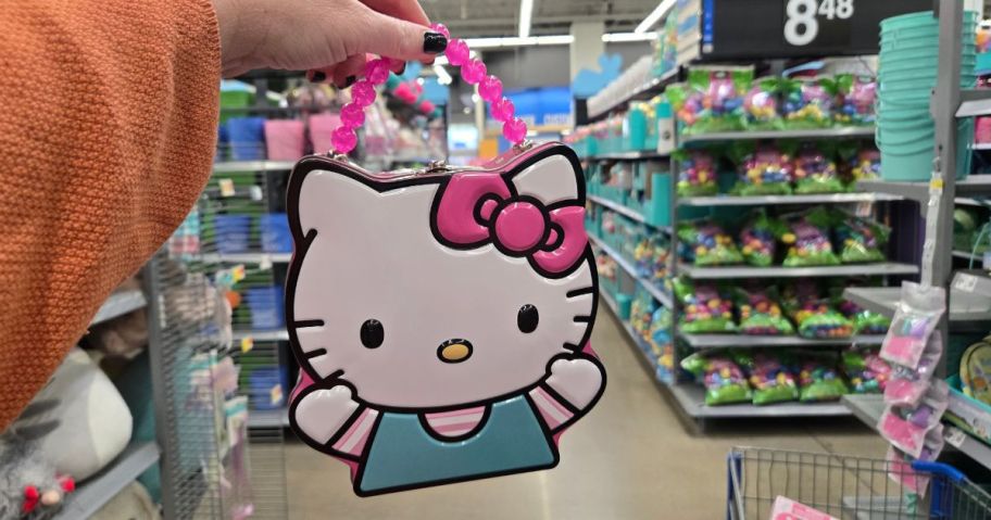 A person holding a Hello Kitty Easter Purse at Walmart