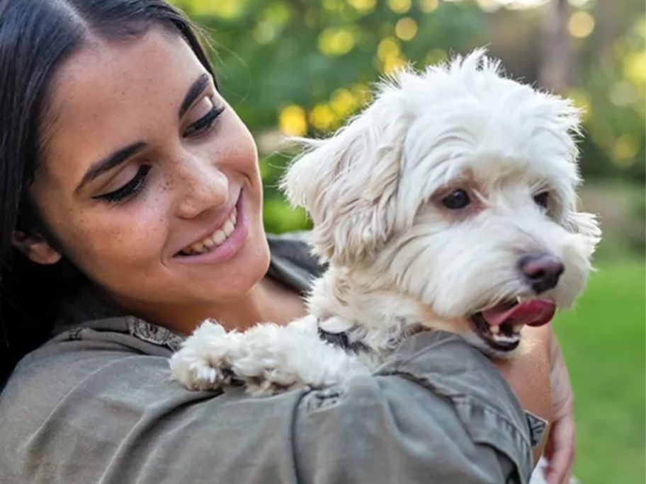 A woman and a cute dog