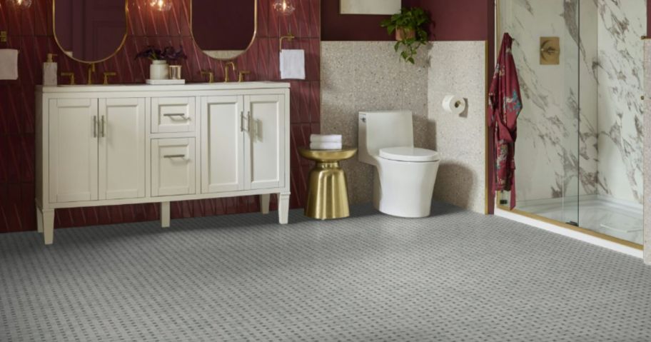 A bathroom with white marble floors