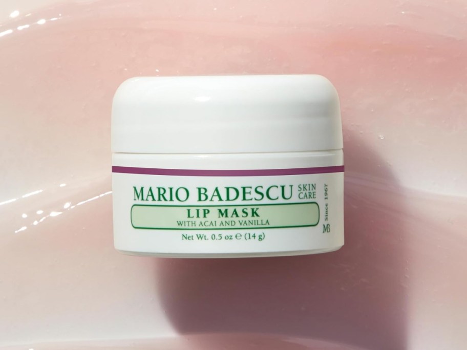 container of mario badescu overnight lip mask with cream in background