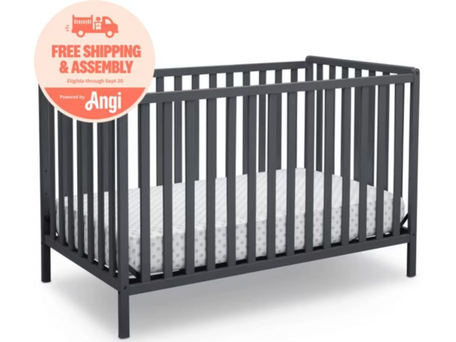 Stock image of a gray Delta Children Heartland 4-in-1 Convertible Baby Crib