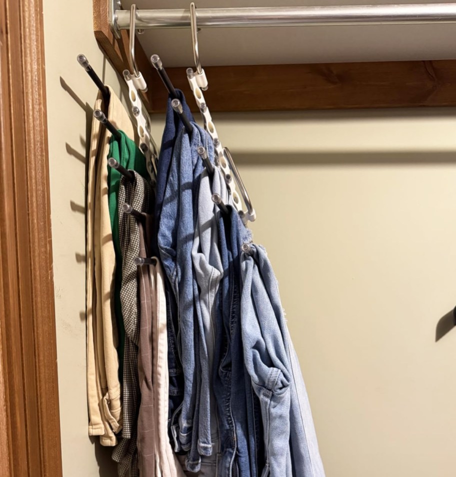 pants hanging vertically in closet on pants hangers