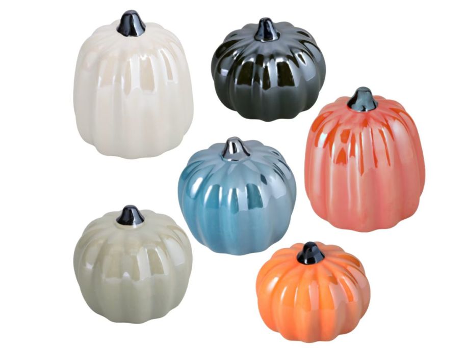 multiple procelain pumpkins in different colors displayed 