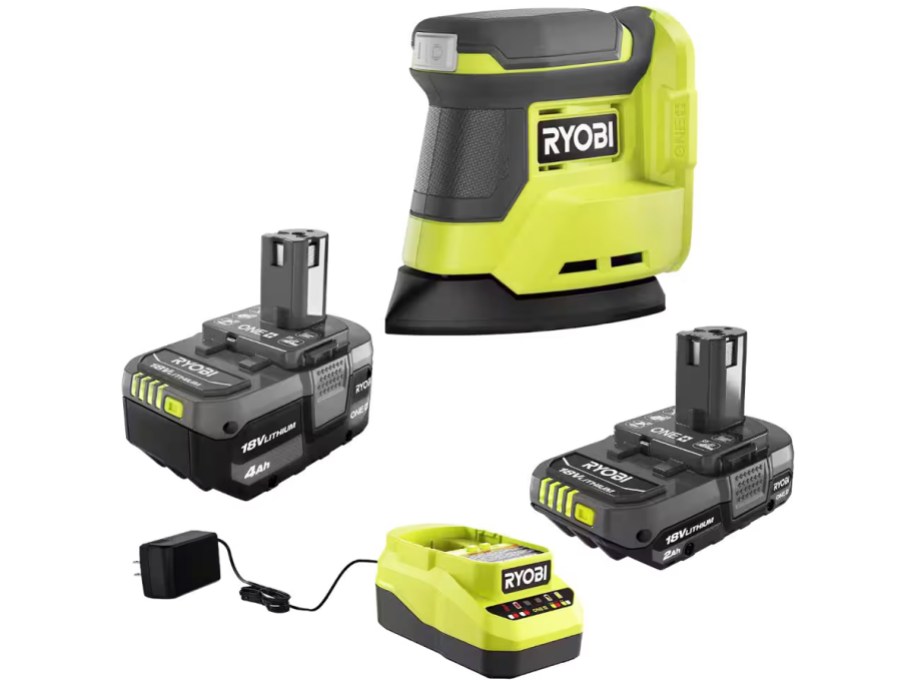 green and black corner sander, two batteries, and charger