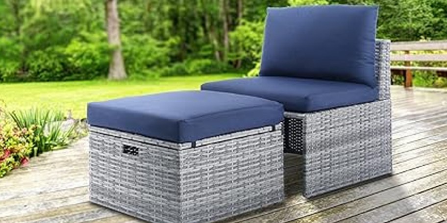 navy blue and gray chair and ottoman on wood deck