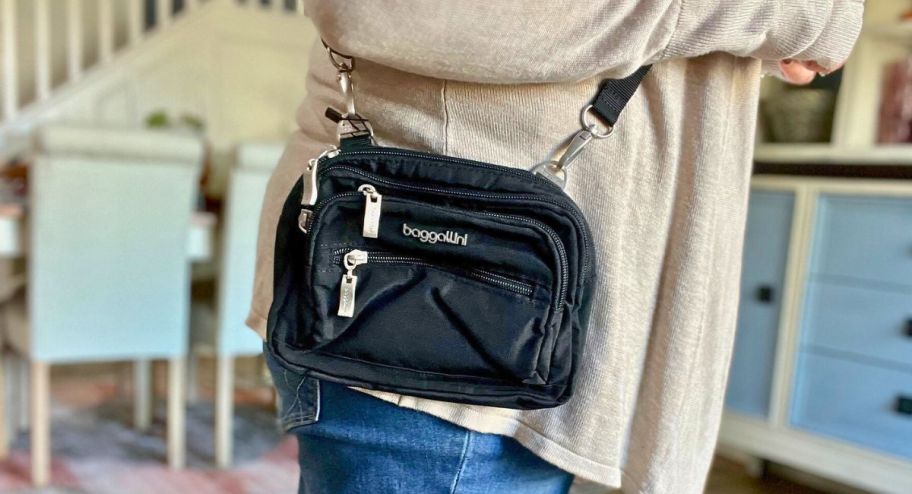 woman wearing a baggallini bag 