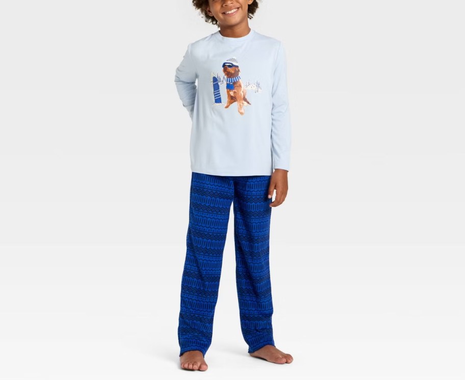 boy modeling christmas dog ski pajamas