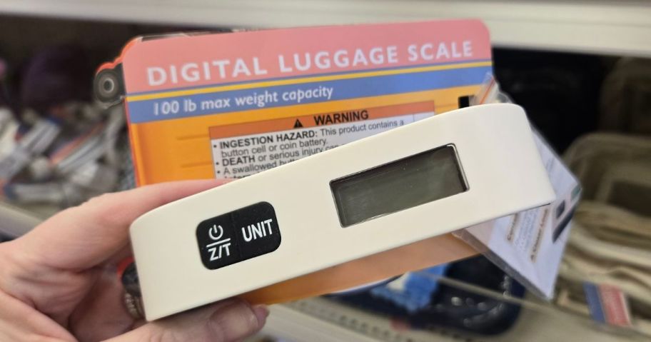 Vivitar Digital Luggage Scale in hand in store