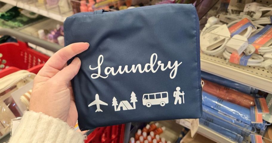 Travel Laundry Bag in hand in store