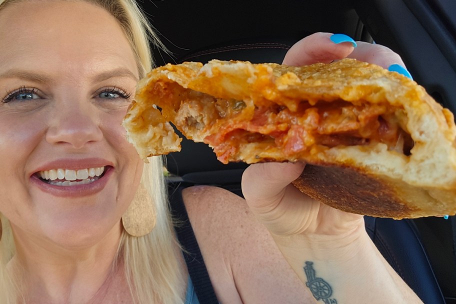 woman holding calzone