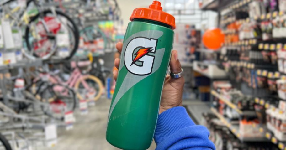 A green gatorade squeeze water bottle