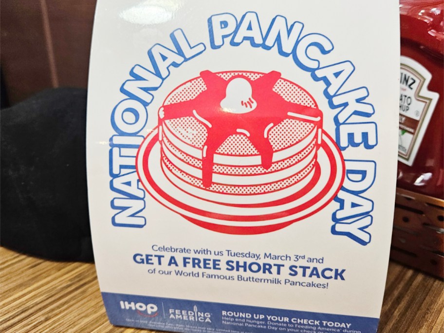 national pancake day sign on table
