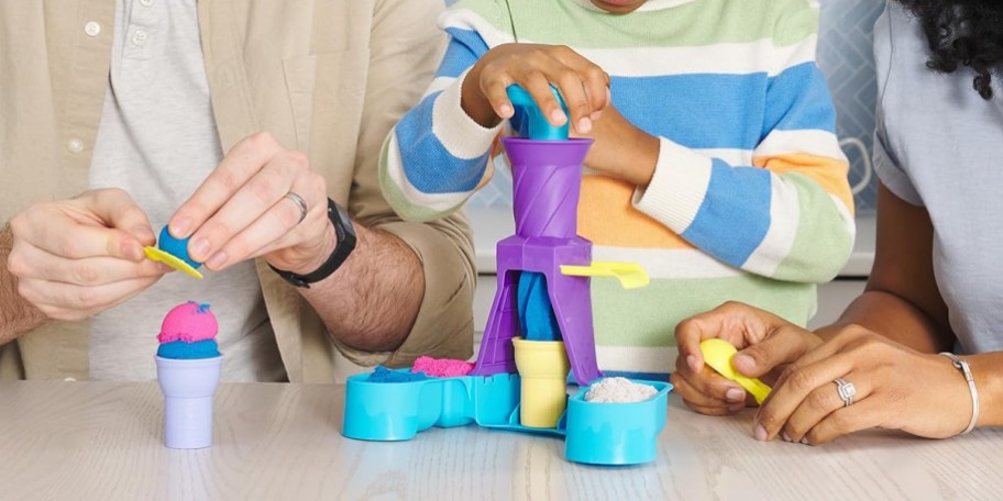 kinetic sand and soft serve playset on table